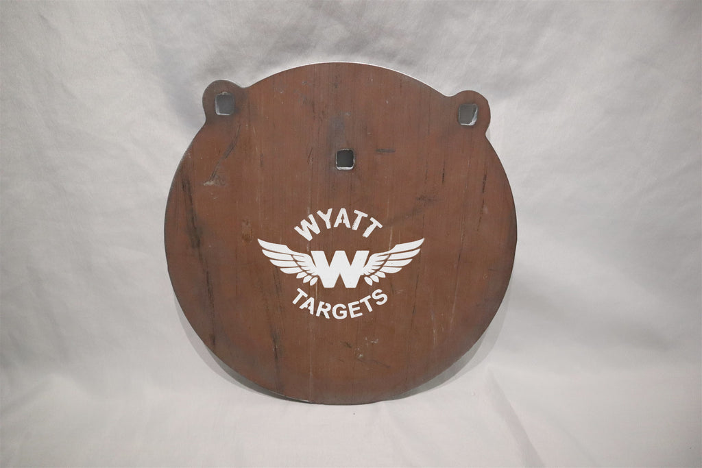 12-inch gong, 1/2-inch AR500 steel, surface rust, three 9/16-inch square mounting holes, two ears, original studio view; individual included component