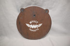 12-inch gong, 1/2-inch AR500 steel, surface rust, three 9/16-inch square mounting holes, two ears, original studio view; individual included component