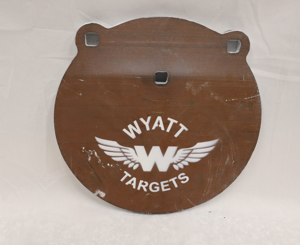 Real photo: 10″ 1/2″ AR500 steel gong, unpainted surface-rust finish with a white Wyatt Targets logo