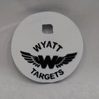 Real photo: 4″ 1/2″ AR500 steel gong, white paint with the Wyatt Targets logo