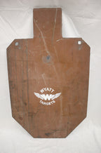 Real photo: full-size IPSC 1/2″ AR500 steel silhouette, unpainted surface-rust finish with a white Wyatt Targets logo