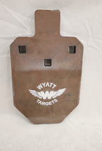 Real photo: IPSC 33% 1/2″ AR500 steel silhouette, unpainted surface-rust finish with a white Wyatt Targets logo
