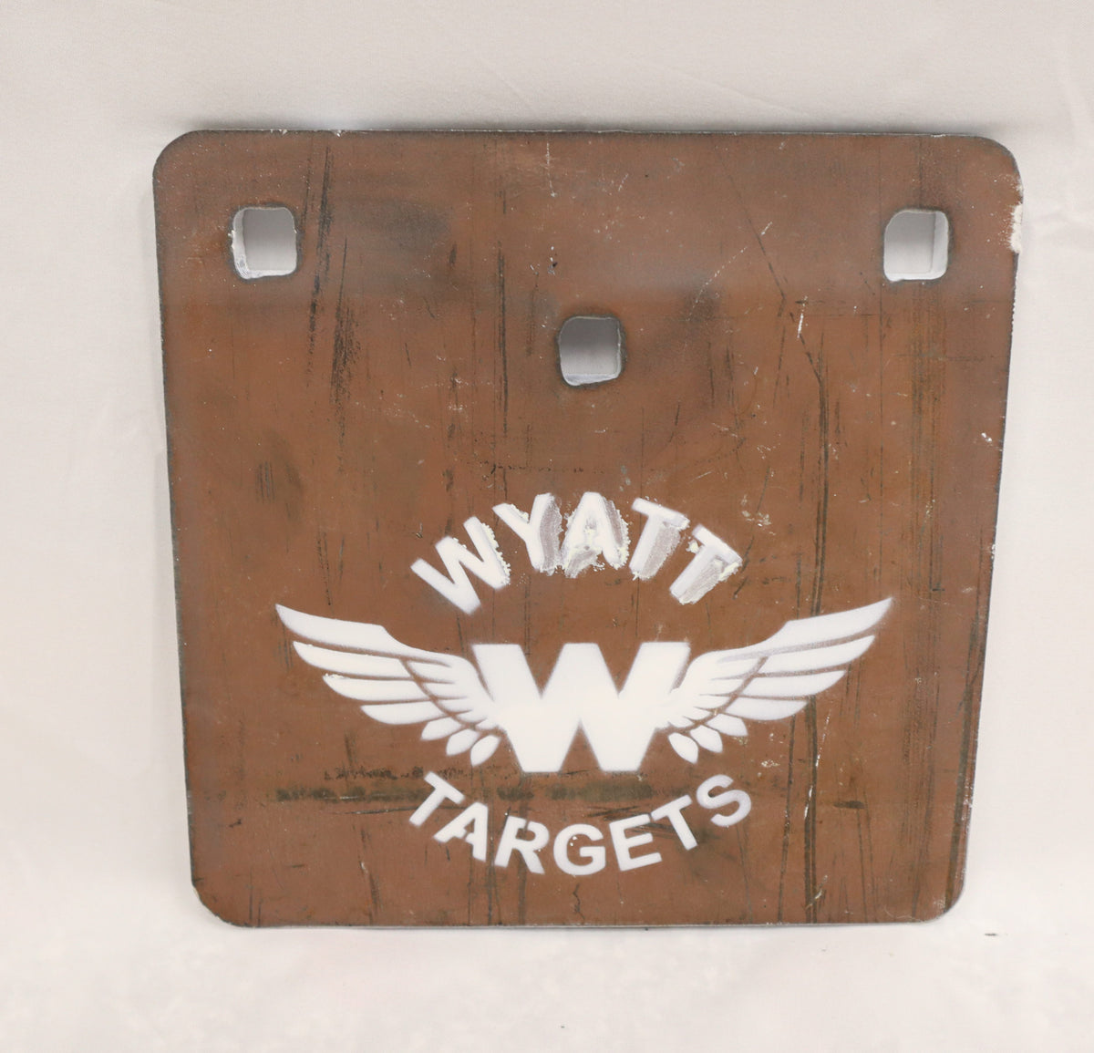 Real photo: 8×8″ 1/2″ AR500 steel square plate, unpainted surface-rust finish with a white Wyatt Targets logo