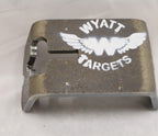 Real photo: Wyatt T-post target hanger, overhead view showing the T-post slot and painted logo